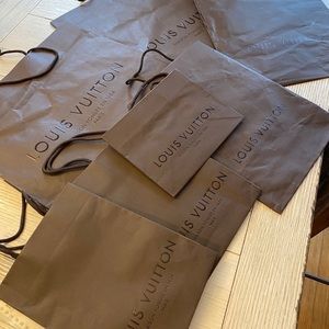 Selling 7 Louis Vuitton Shopping Bags
